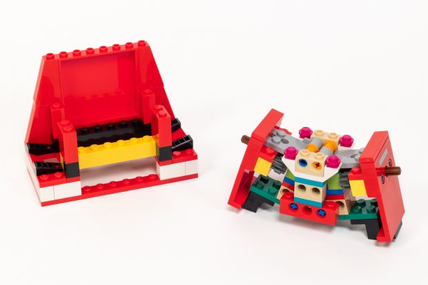 You can see the gears hidden inside the torso to add friction.