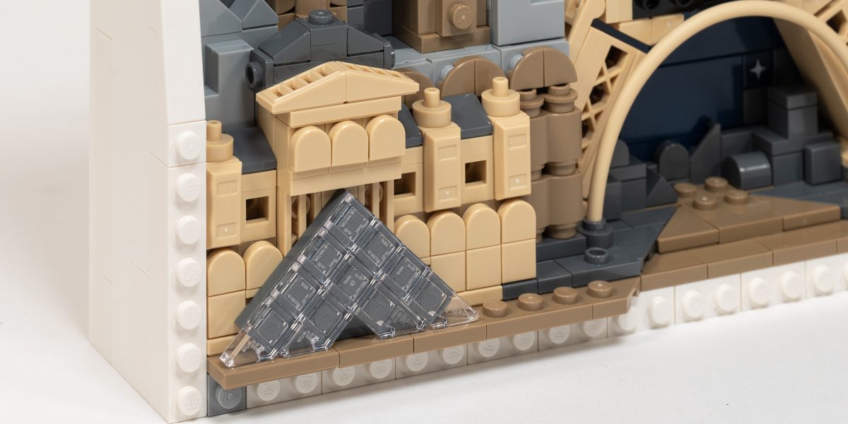 The Louvre featuring the prominent glass pyramid for an entrance.