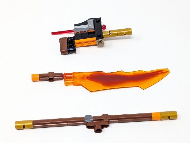 The set includes 3 weapons that the mech can wield.