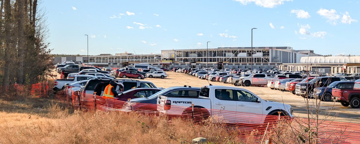 Looking west from the construction entrance, you can see the massive scope of the east-facing wall.