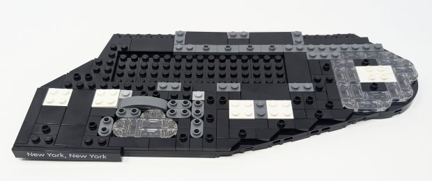 The footprint is designed to depict the shape of Manhattan Island.