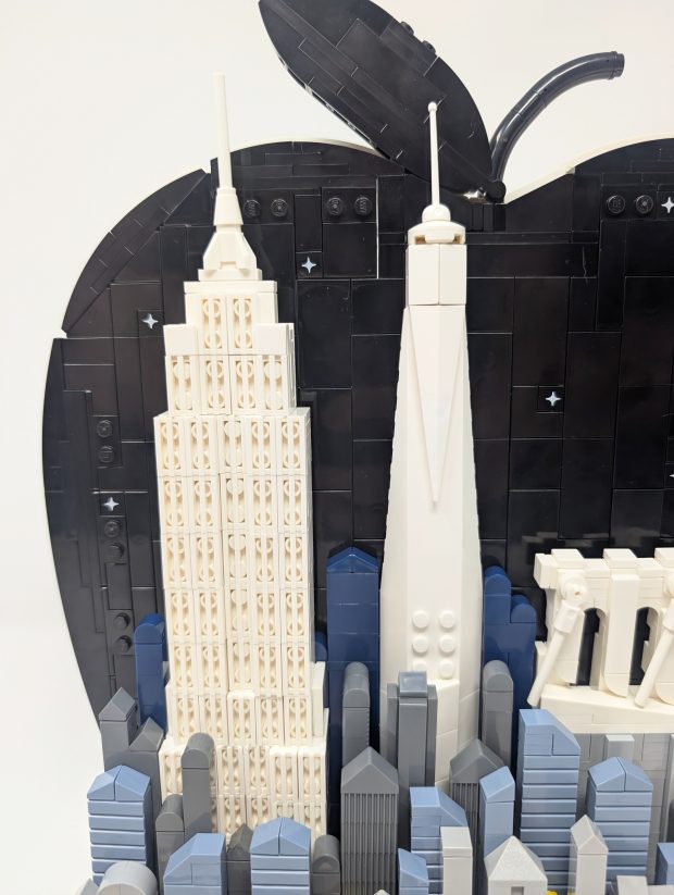 The Empire State Building and the One World Trade Center tower above all in the city.